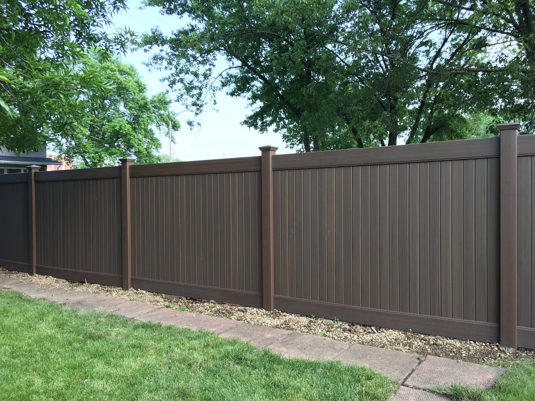 Vinyl Fence in residential backyard